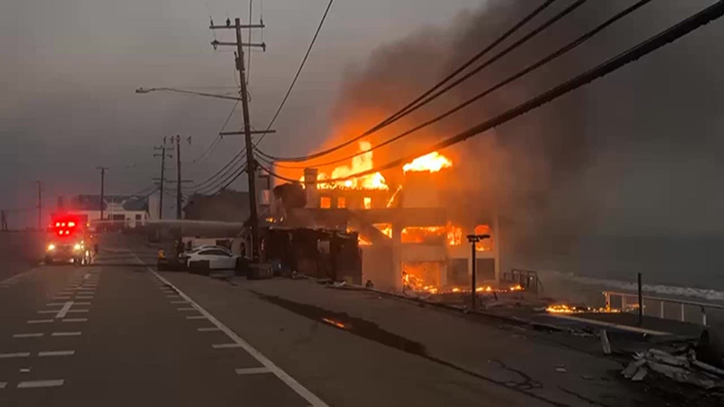 A fast-moving fire broke out in the hills above Hollywood Blvd. as firefighters battled to get control on two other major blazes that ravaged communities.