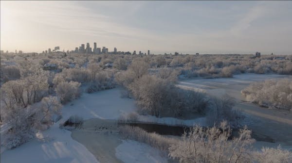 Minnesotans awake to snowy landscape