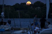 Watch: Super blue moon rises over Lake Harriet in Minneapolis