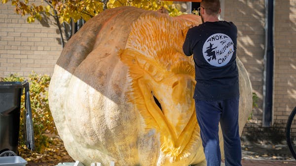 Anoka man carves North America's largest pumpkin into world's largest jack-o-lantern