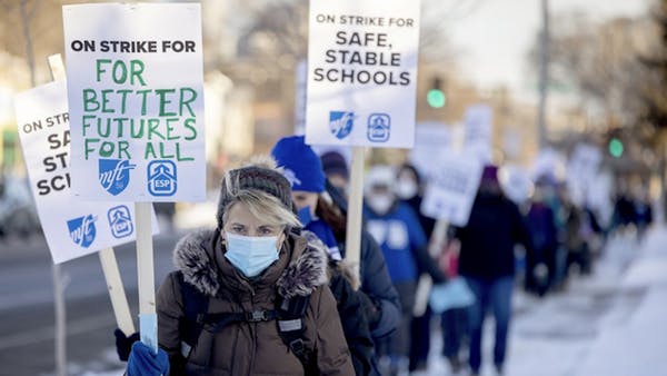 Minneapolis teachers walk picket lines as strike begins