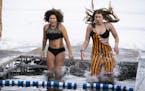 Hundreds celebrate new year and decade with icy dive into Lake Minnetonka