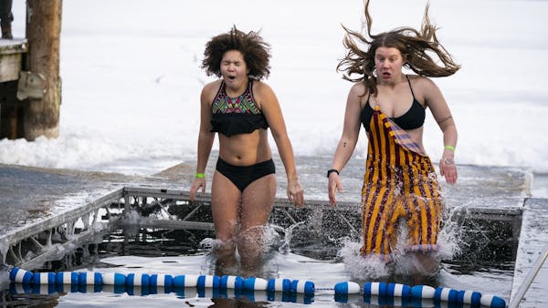 It's always cold and wet at the Lake Minnetonka ice dive