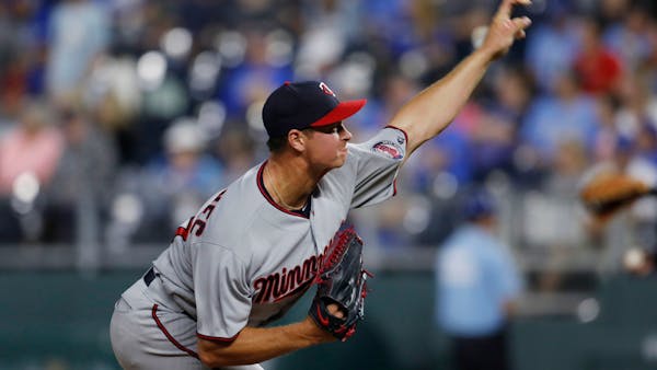 Twins pitchers open well, then Royals bomb Busenitz for the win