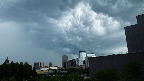 Storm front rolls over downtown Minneapolis