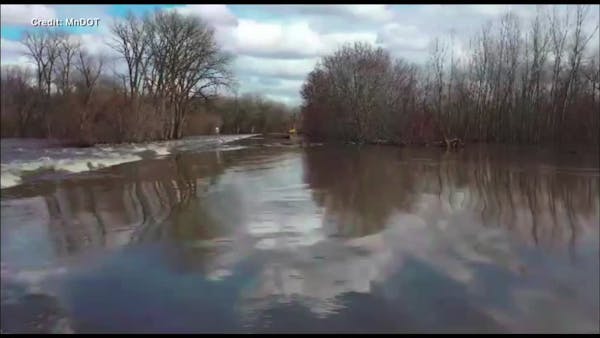 Drone video shows flooding over highway in Le Sueur