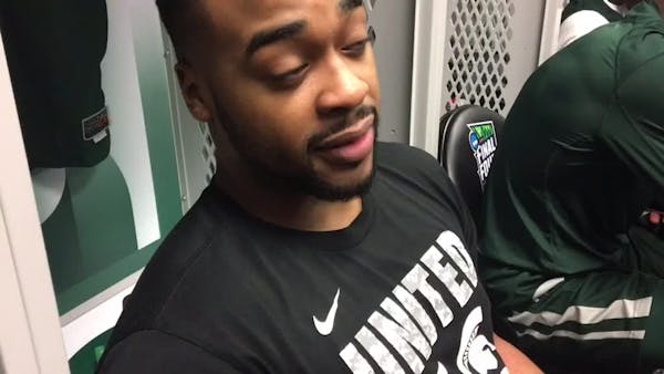 Michigan State players talk at Final Four