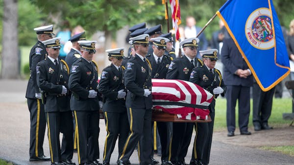 Slain corrections officer is saluted by thousands