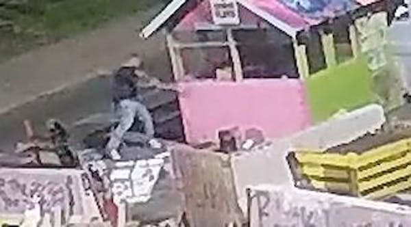 Video shows ax-wielding man vandalizing to George Floyd Square
