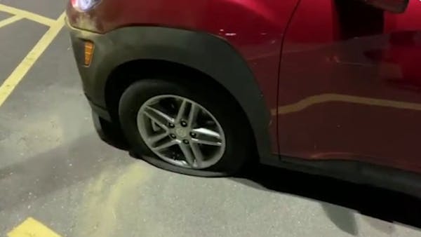 Video shows Minneapolis parking lot of cars with tires slashed