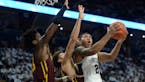 Oturu's career-high 32 points not enough for Gophers at Penn State