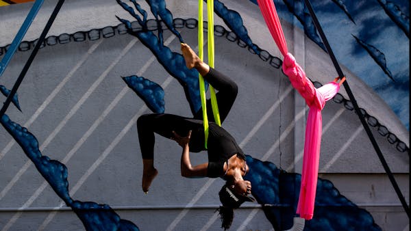 Watch: Aerial circus art instructor reminds community, 'We must breathe'
