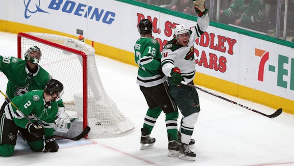 Wild rallies late in Dallas for third straight win