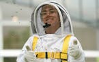 Amateur beekeeper stages a honey of a rescue in downtown Mpls.