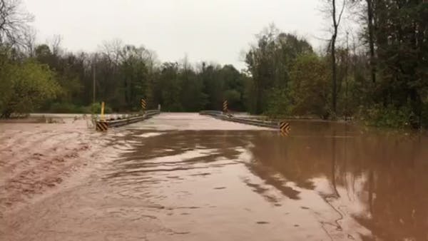 Heavy rain busts river bank in Wisconsin
