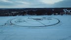Minnesota man makes carousel out of enormous floating disk of ice