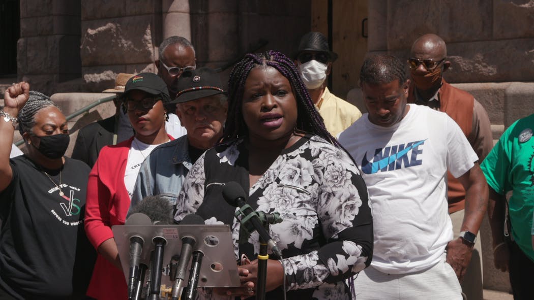 Rosemary Nevils-Williams, mother of slain activist Tyrone Williams, joined community leaders Thursday outside Minneapolis City Hall.