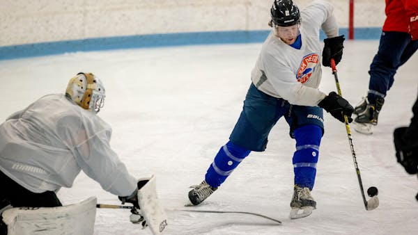 Pick-up hockey players in Edina strap on their skates again