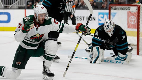 Wild moves into playoff spot with win over Sharks
