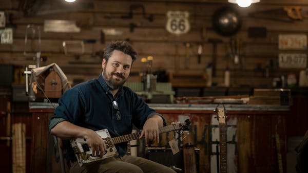 Minneapolis man resurrects a storied folk instrument: The cigar box guitar