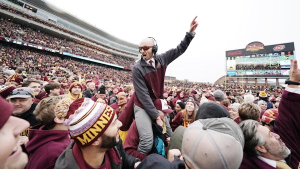 Giddy Gophers fans rush field after big win, kicking off wild celebrations