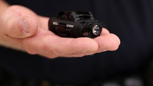 Officers demonstrate gun-mounted camera