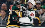 Wild crumbles late, loses 5-4 in overtime to Boston