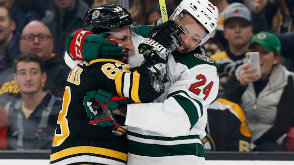 Wild falls apart late, earns a point in overtime loss to Bruins