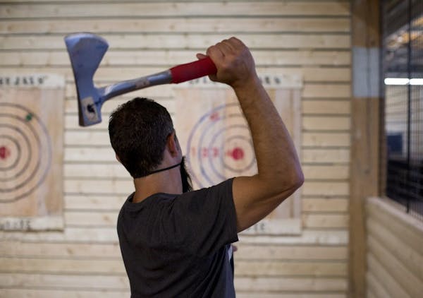 Indoor ax throwing is at the cutting edge of fun in the Twin Cities