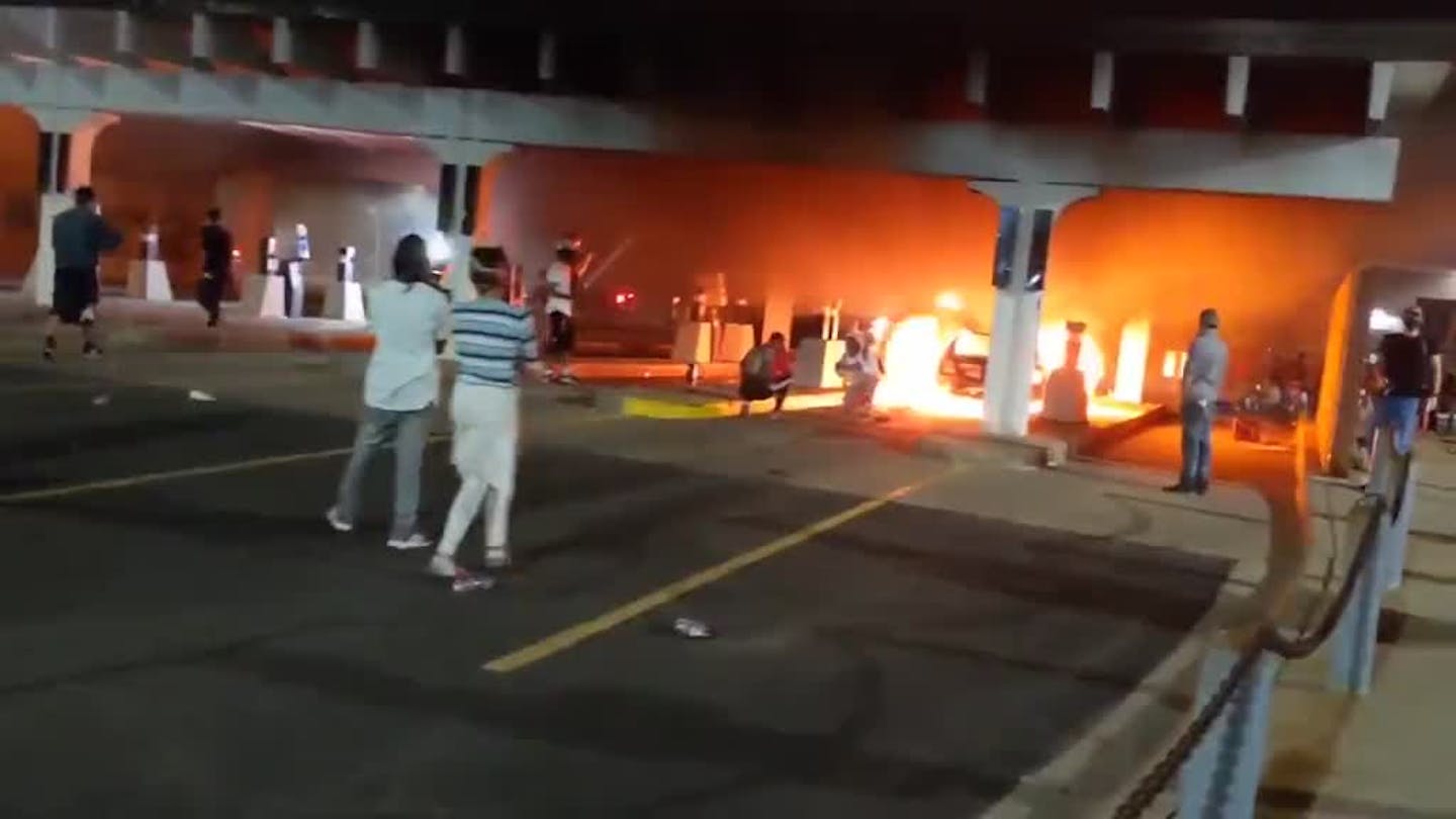 Fires burn along Lake Street as thousands ignore curfew