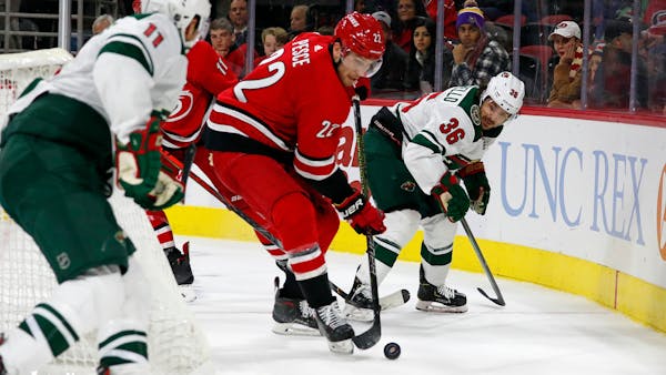 Wild's point streak ends in blowout loss to Hurricanes