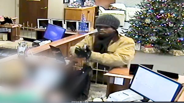 Video shows man robbing Lakeville bank