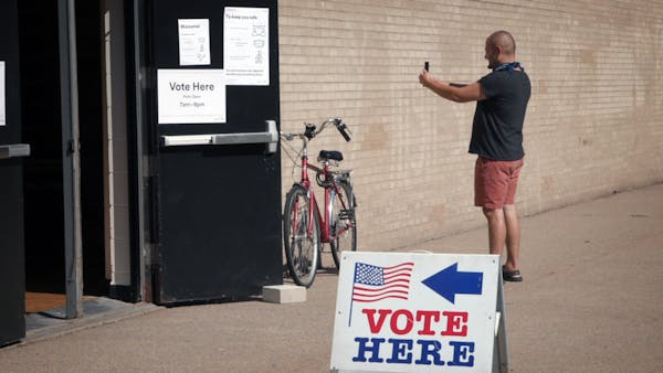 Voters who didn't cast mail-in ballots trickle to the polls