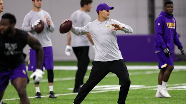 Access Vikings' first look at Cousins with his new team