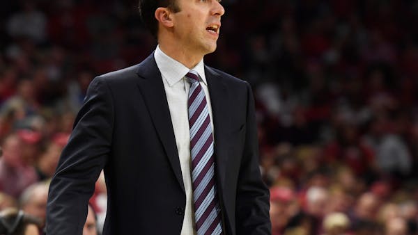 Slide continues as No. 14 Gophers fall 95-79 at unranked Arkansas