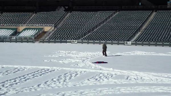 Target Field hosts giant design by snowshoe artist