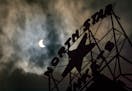 Cloudy skies aside, Minnesotans fully dazzled by partial eclipse