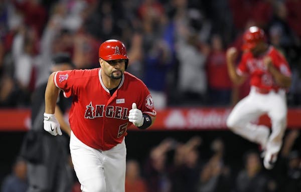 Pujols reaches 600 career home runs with grand slam off Twins