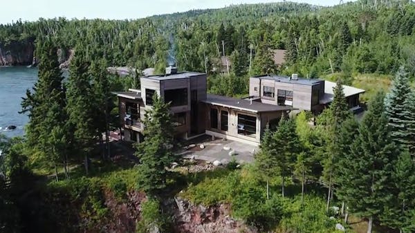 Modern home overlooks Lake Superior, includes a Zen spa room