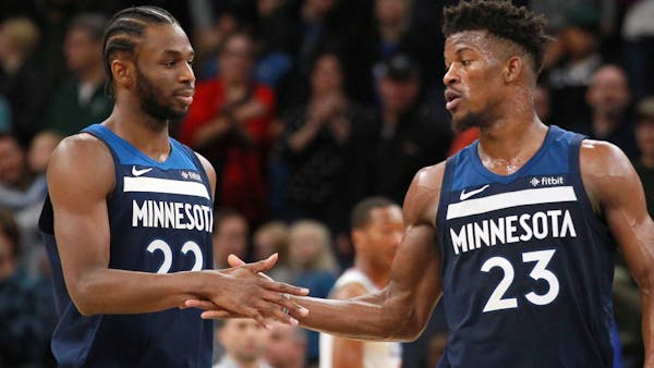 Jimmy Buckets saves game, Wolves 112-106