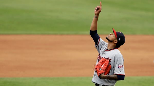 Santana does it all as Twins beat Padres