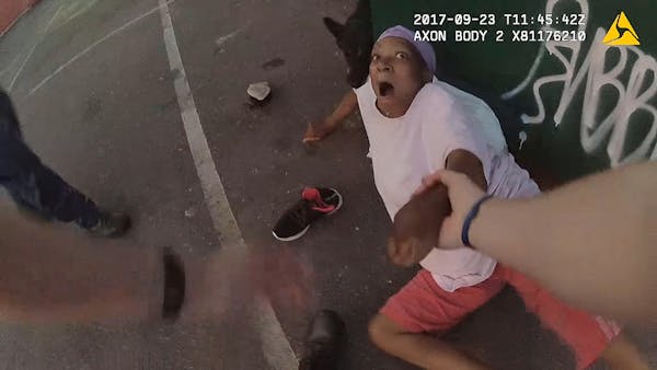 Bodycam video shows police dog attack on woman