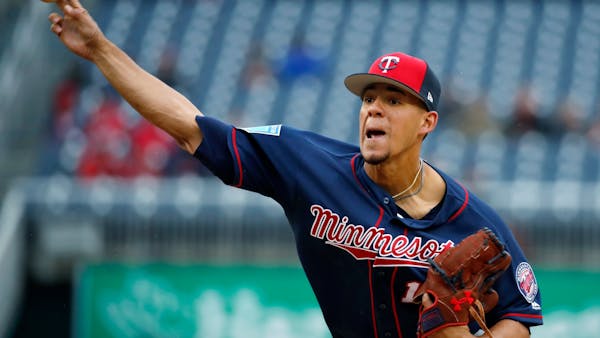 Twins close exhibition season with 3-1 win over Nationals