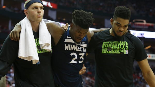 Wolves react after Butler injured in 120-102 loss at Houston