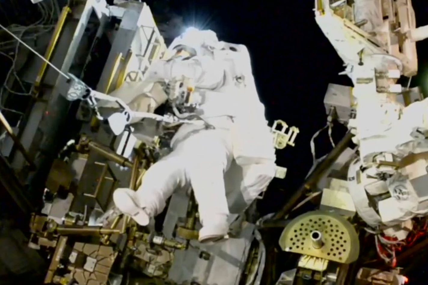 Stuck NASA astronaut steps out on spacewalk after 7 months in orbit