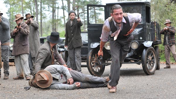 Movie review: 'Lawless' moonshiners