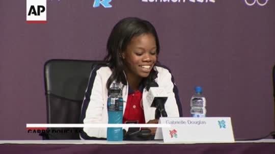 16-year-old gymnast Gabby Douglas is enjoying the fame that comes with winning the all-around Olympic gold. She told the media Thursday that the label of "America's sweetheart" sits fine with her, and is fitting.