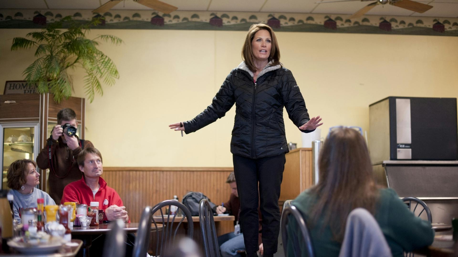 Michele Bachmann compares herself to former British Prime Minister Margaret Thatcher at an Iowa stop just before her campaign chair resigned.