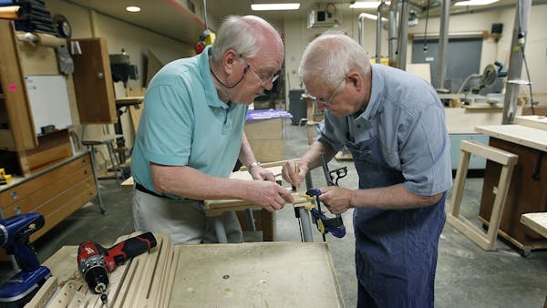 Volunteers handcraft specialized tools for students with special needs
