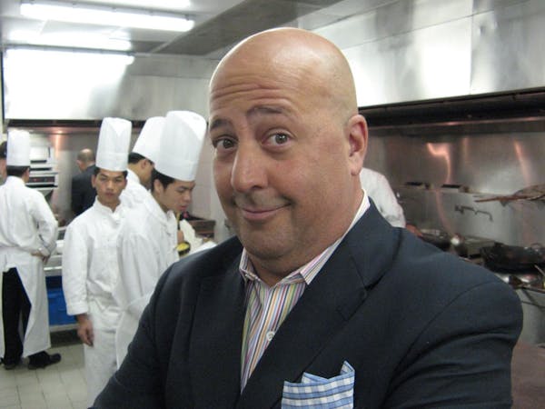 Chef Andrew Zimmern's as spicy as dishes he dines on for 'Bizarre Foods'